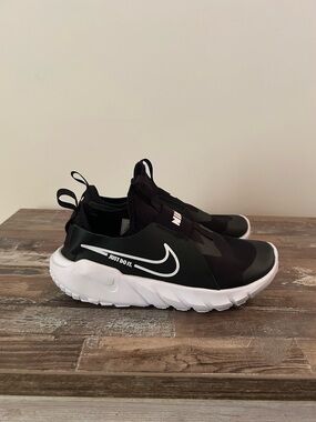 Nike Kids Black and White Slip-On Sneakers with Swoosh